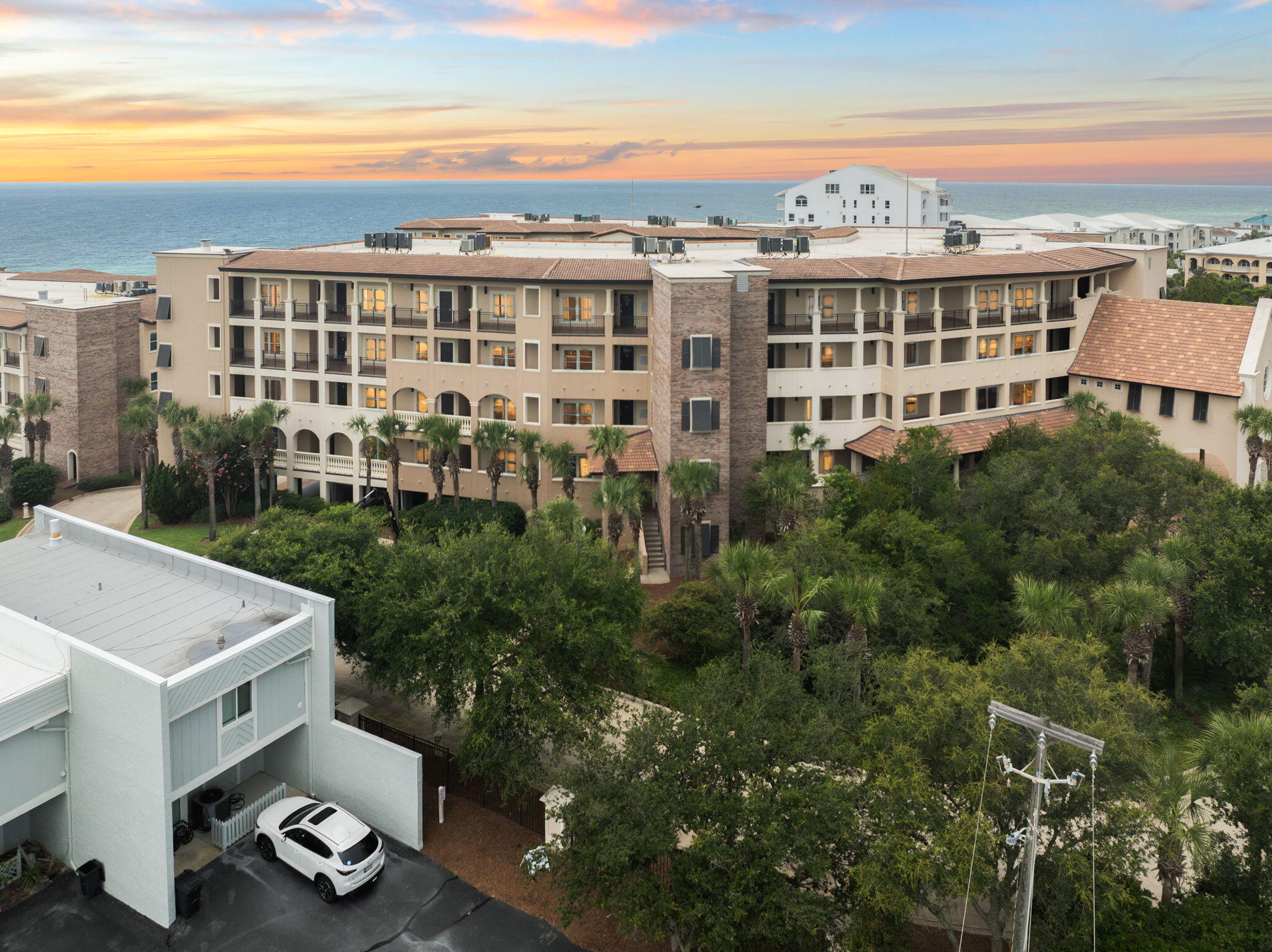 56 Blue Mountain Road, Unit B105 Santa Rosa Beach, FL 32459 - Photo 72 of 98 a view of a city that has tall buildings and a big yard