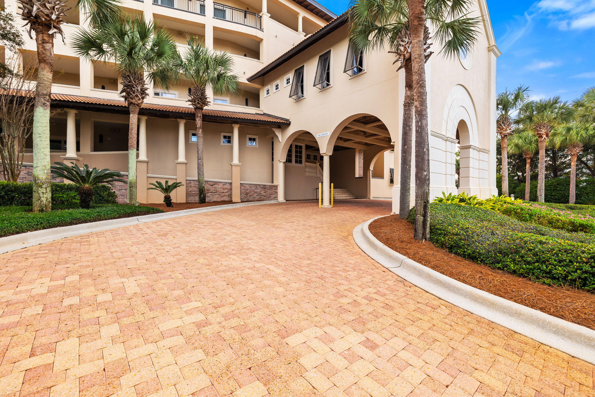 56 Blue Mountain Road, Unit B105 Santa Rosa Beach, FL 32459 - Photo 78 of 98 a front view of a house with garden