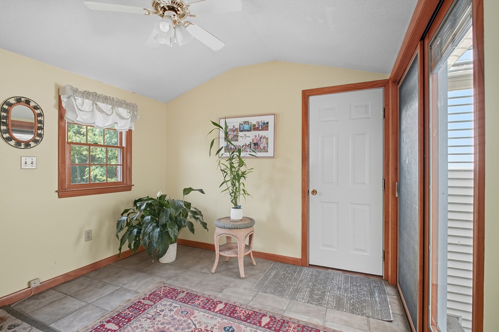 22 Hartwick Street Springfield, MA 01108 - Photo 11 of 29 a living room with furniture and a window