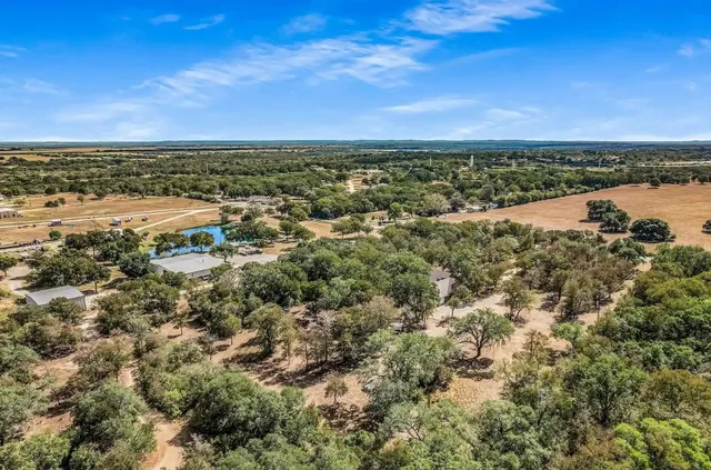 an aerial view of beach and ocean