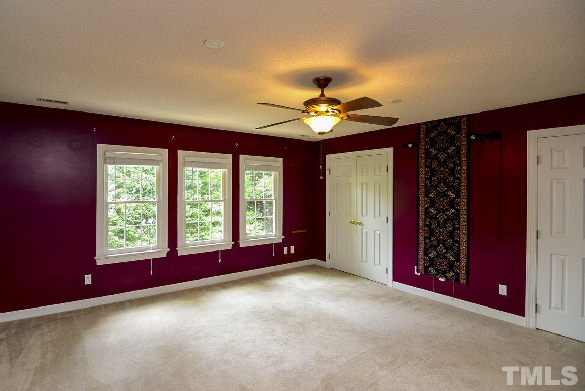 8808 Salute Street Raleigh, NC 27615 - Photo 19 of 25 The large bonus has a bank of windows, and 2 large closets. It could also serve as a 6th Bedroom.