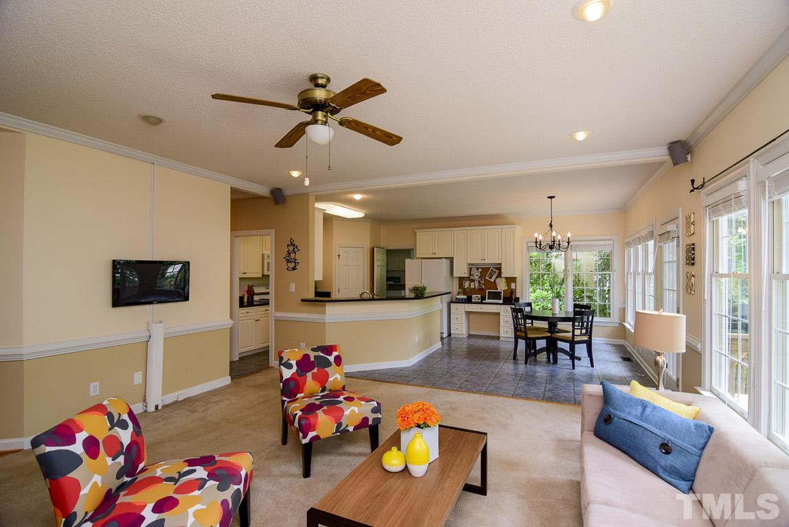 8808 Salute Street Raleigh, NC 27615 - Photo 25 of 25 The family room boasts an open floor plan. keep an eye on what is going on in the family room and the backyard while you cook.