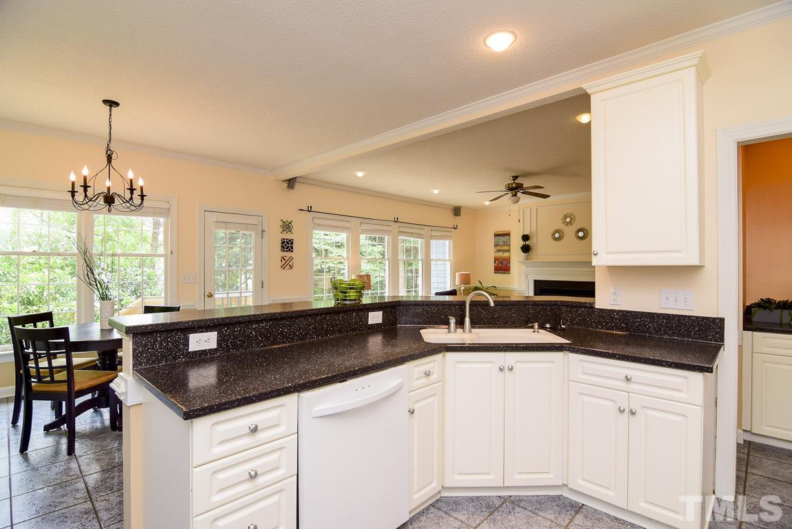 Open kitchen with 42 inch cabinets, while washing dishes you can look out the open window.
