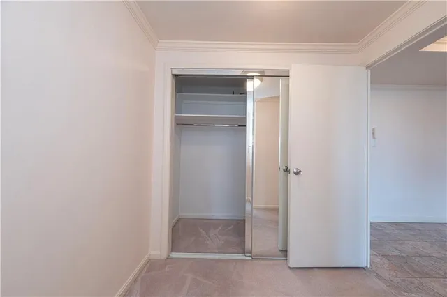 a kitchen with appliances a sink and cabinets