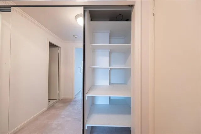 a view of a building with potted plants