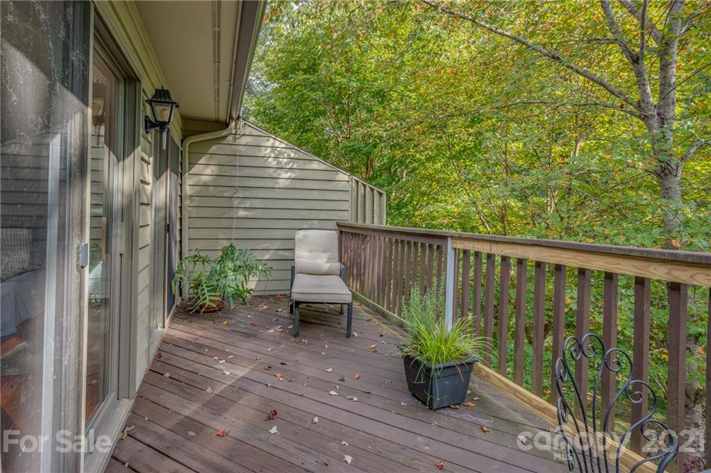 33 Hunting Country Trail Tryon, NC 28782 - Photo 15 of 34 a view of balcony with wooden floor and seating space