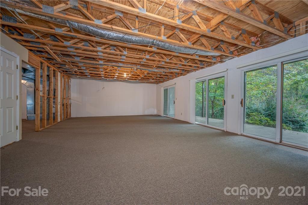 33 Hunting Country Trail Tryon, NC 28782 - Photo 23 of 34 a view of large room with windows