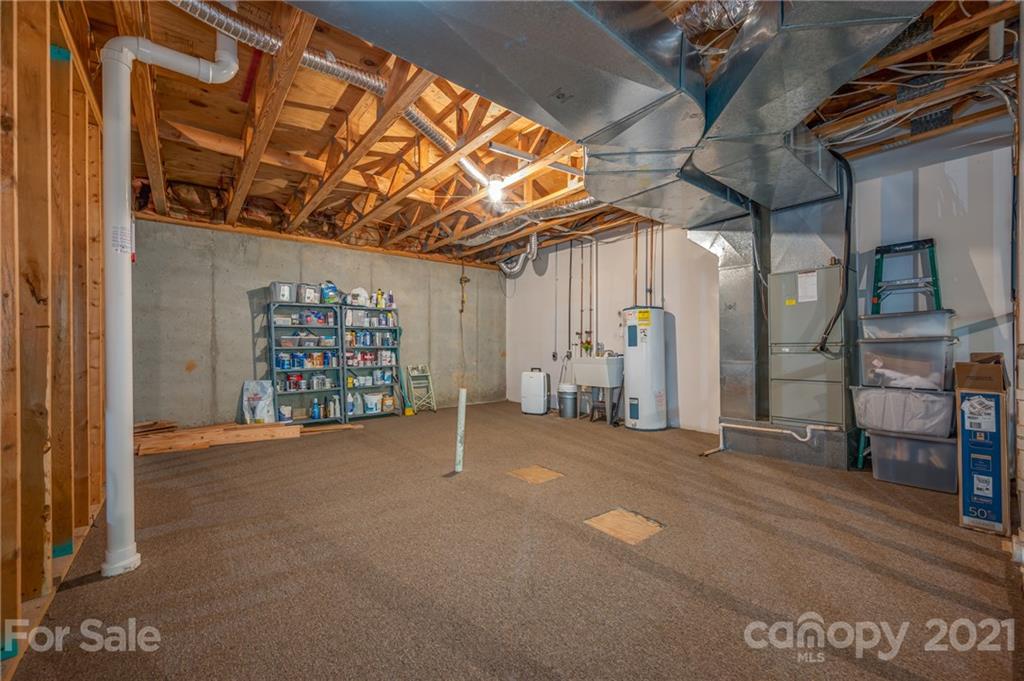 33 Hunting Country Trail Tryon, NC 28782 - Photo 27 of 34 a view of an empty room with a garage