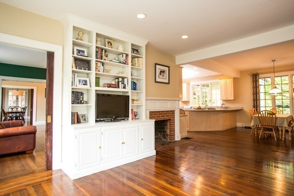 5 Hewins Farm Road Wellesley, MA 02481 - Photo 12 of 18 a living room with stainless steel appliances kitchen island granite countertop a stove and a view of living room