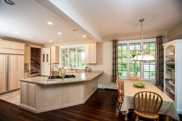 5 Hewins Farm Road Wellesley, MA 02481 - Photo 13 of 18 a dining room with furniture a chandelier and wooden floor