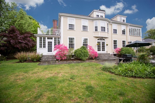 5 Hewins Farm Road Wellesley, MA 02481 - Photo 18 of 18 a front view of white house with garden