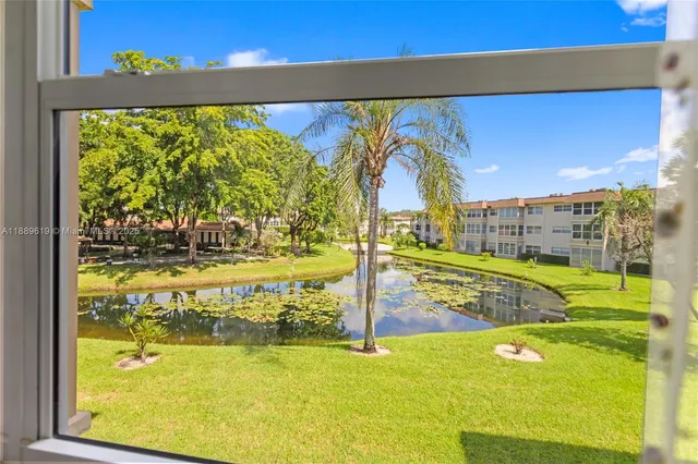 a view of swimming pool with a garden