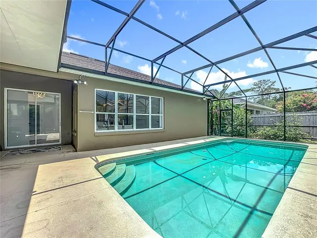a view of house with yard and street view