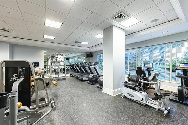 a view of a patio with table and chairs