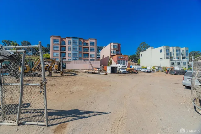 a view of a car parked in front of a house