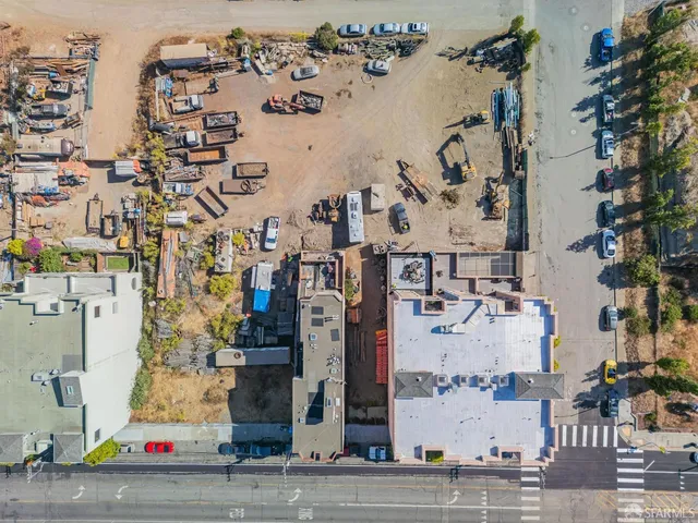 a view of a city with ocean