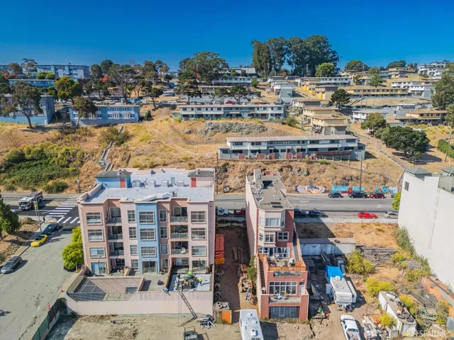 a view of a city and ocean view