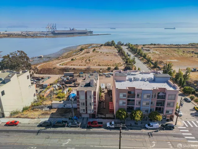 a view of a large building with ocean view