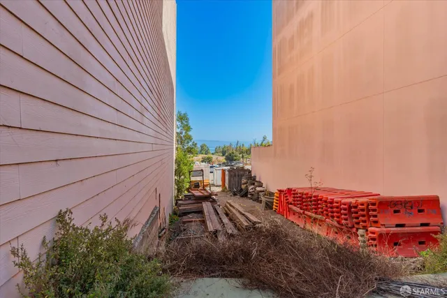 a bathroom with a sink mirror and a window