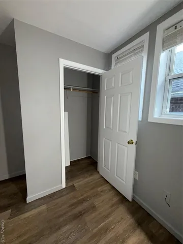 a view of porch with a small yard