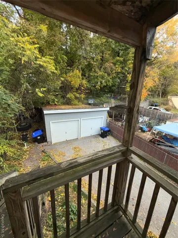 a view of a backyard with trees