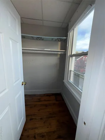 a kitchen with a stove a sink and a microwave