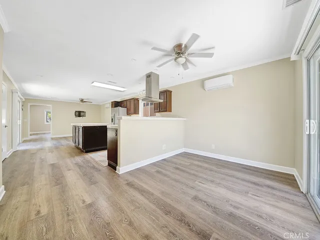 a view of a kitchen with a sink and a microwave