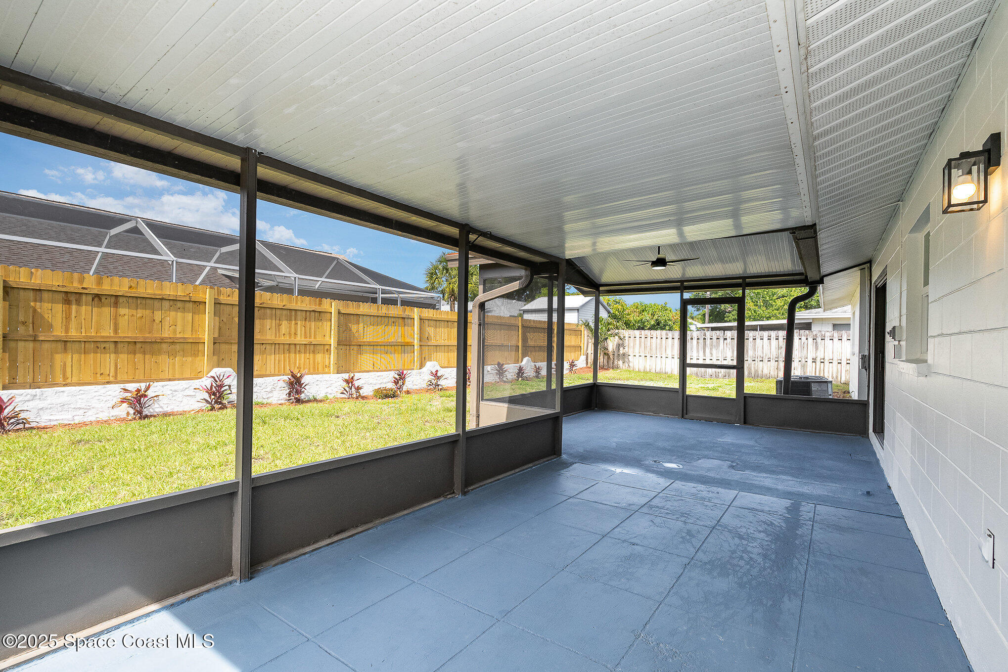 906 Kings Post Road Rockledge, FL 32955 - Photo 25 of 31 a view of an empty room with a window
