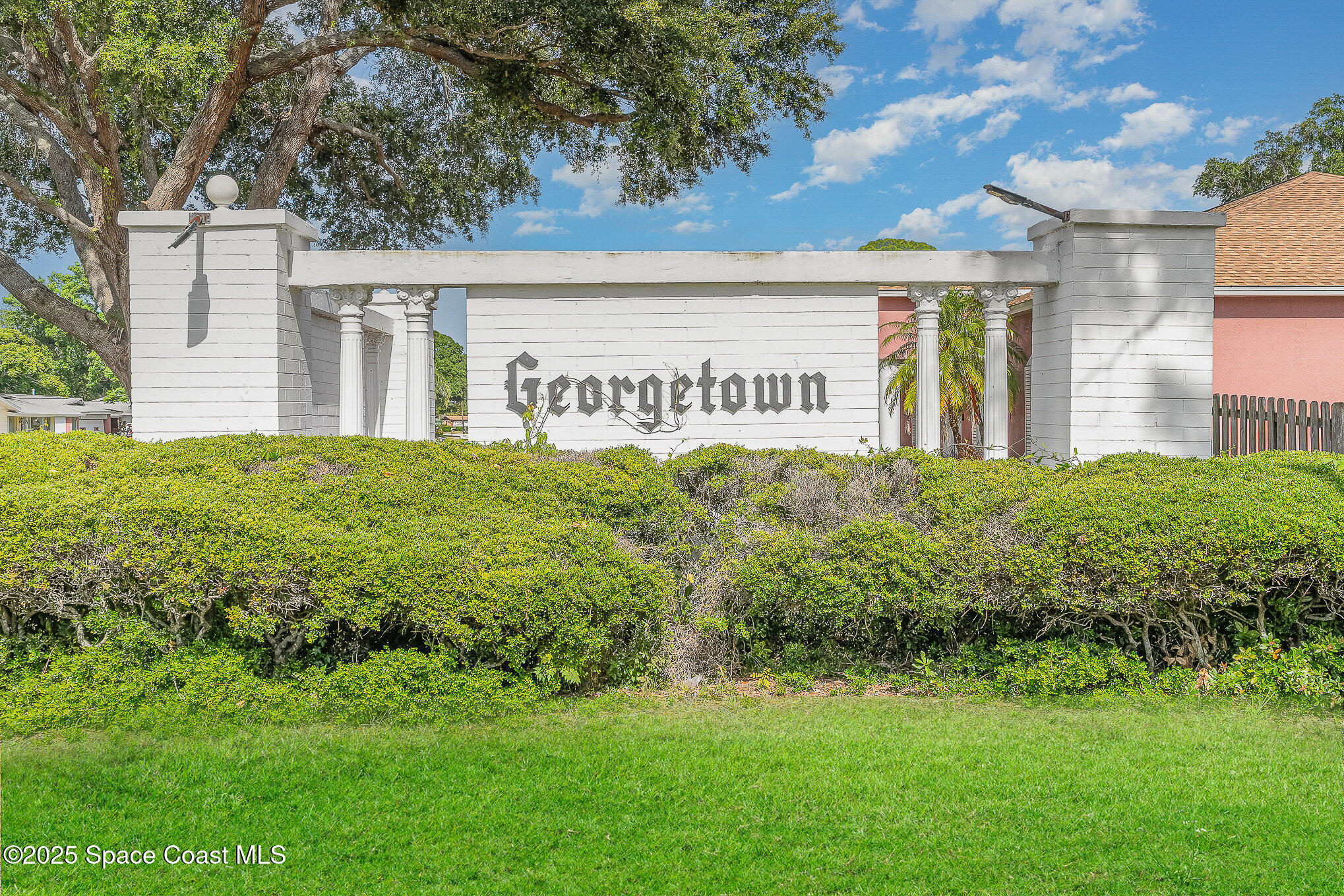 906 Kings Post Road Rockledge, FL 32955 - Photo 30 of 31 a view of a house with a garden