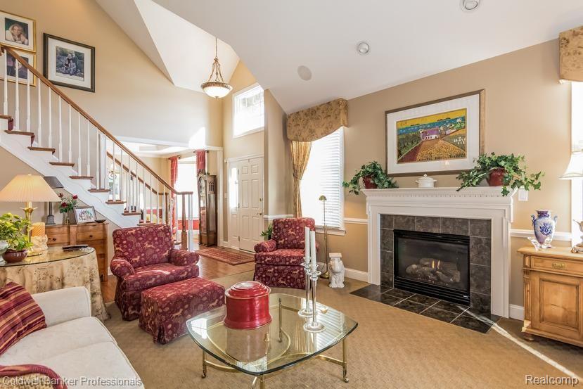 24901 Reeds Pointe Drive, Unit 16 Novi, MI 48374 - Photo 6 of 50 Living Room with Fireplace