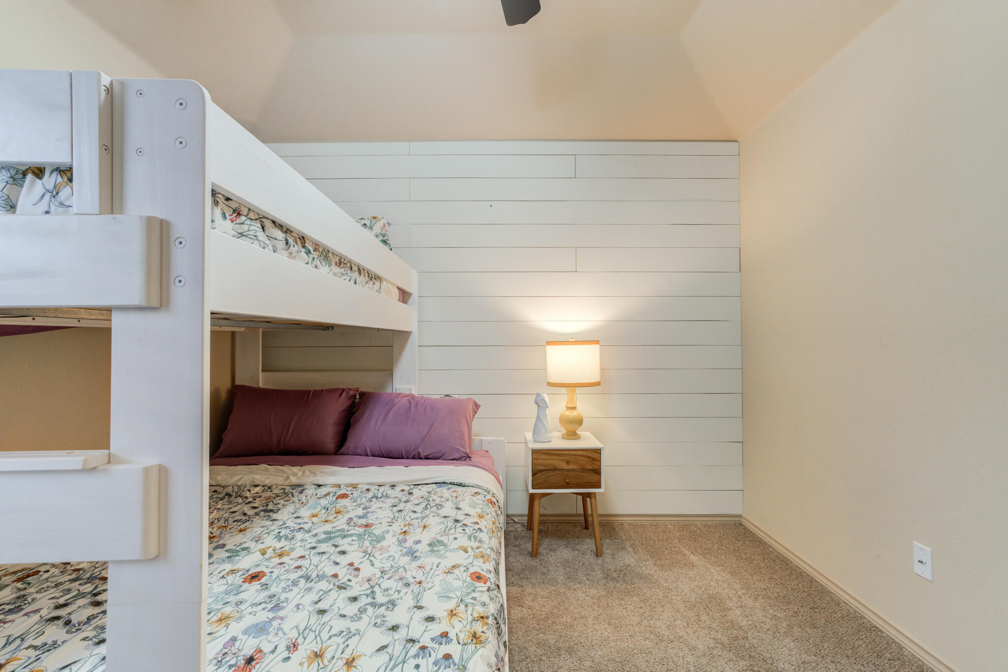 2206 101st Street Lubbock, TX 79423 - Photo 31 of 37 a bedroom with a bed and a couch