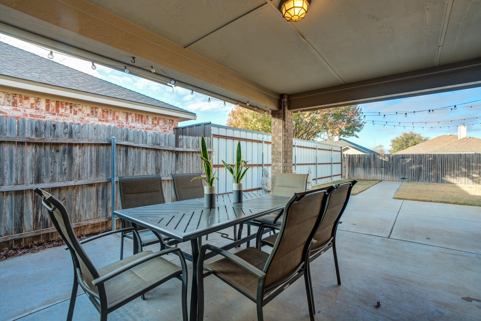 2206 101st Street Lubbock, TX 79423 - Photo 33 of 37 a view of a chairs and table in the balcony