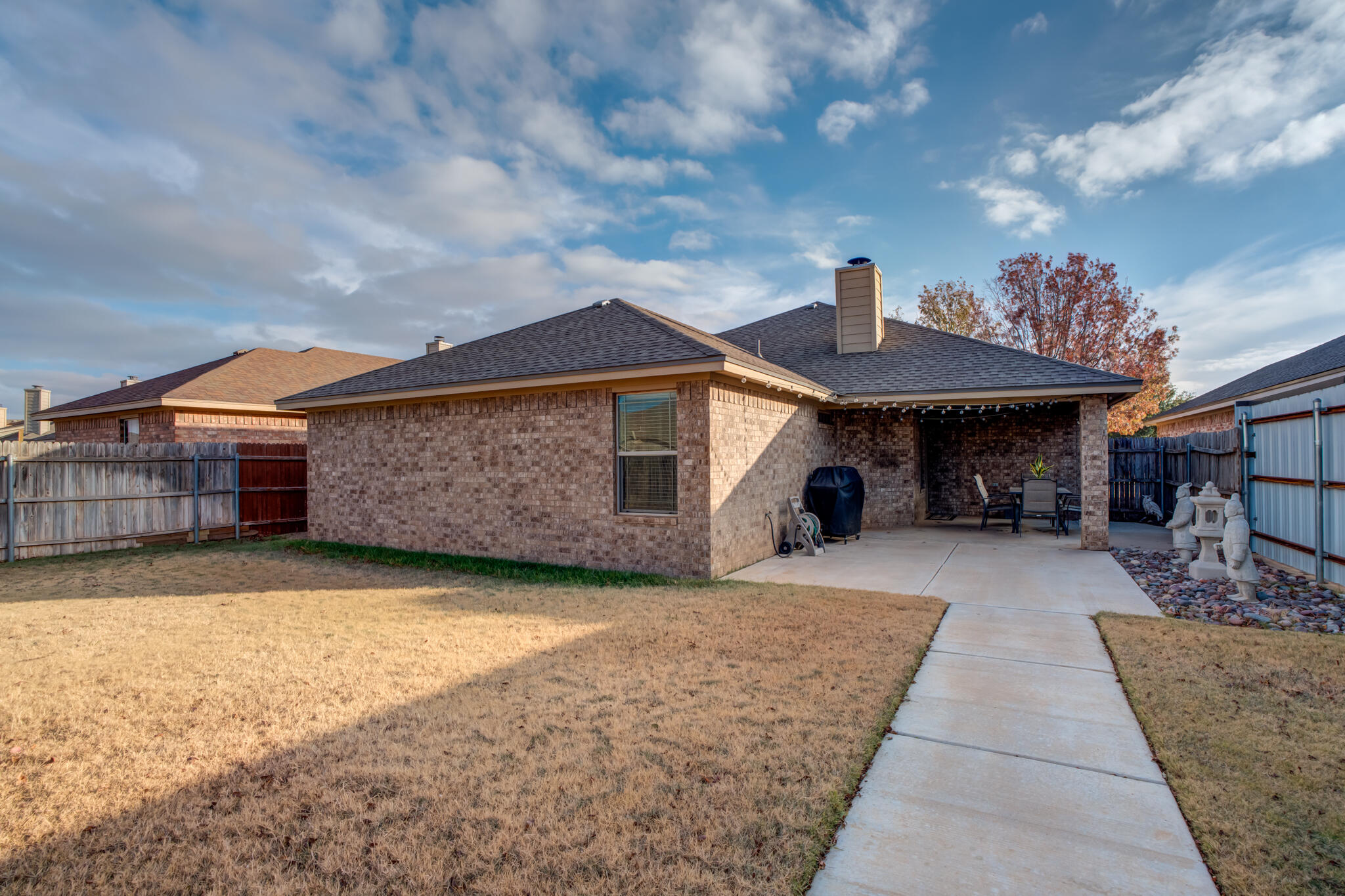 2206 101st Street Lubbock, TX 79423 - Photo 36 of 37 a front view of a house with a porch