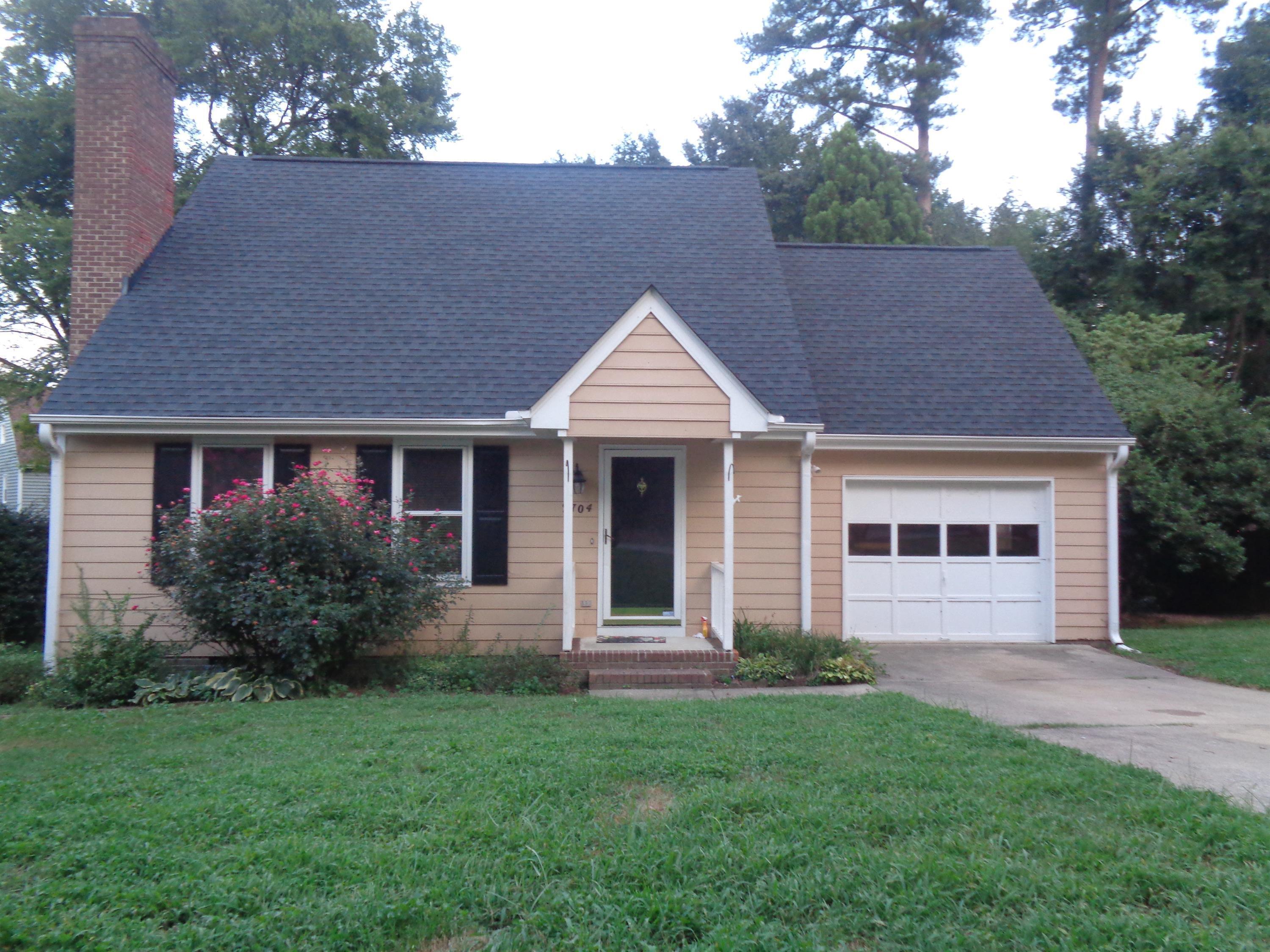 2704 Moorsfield Court Raleigh, NC 27604 - Photo 1 of 25 a view of outdoor space yard and front view of a house