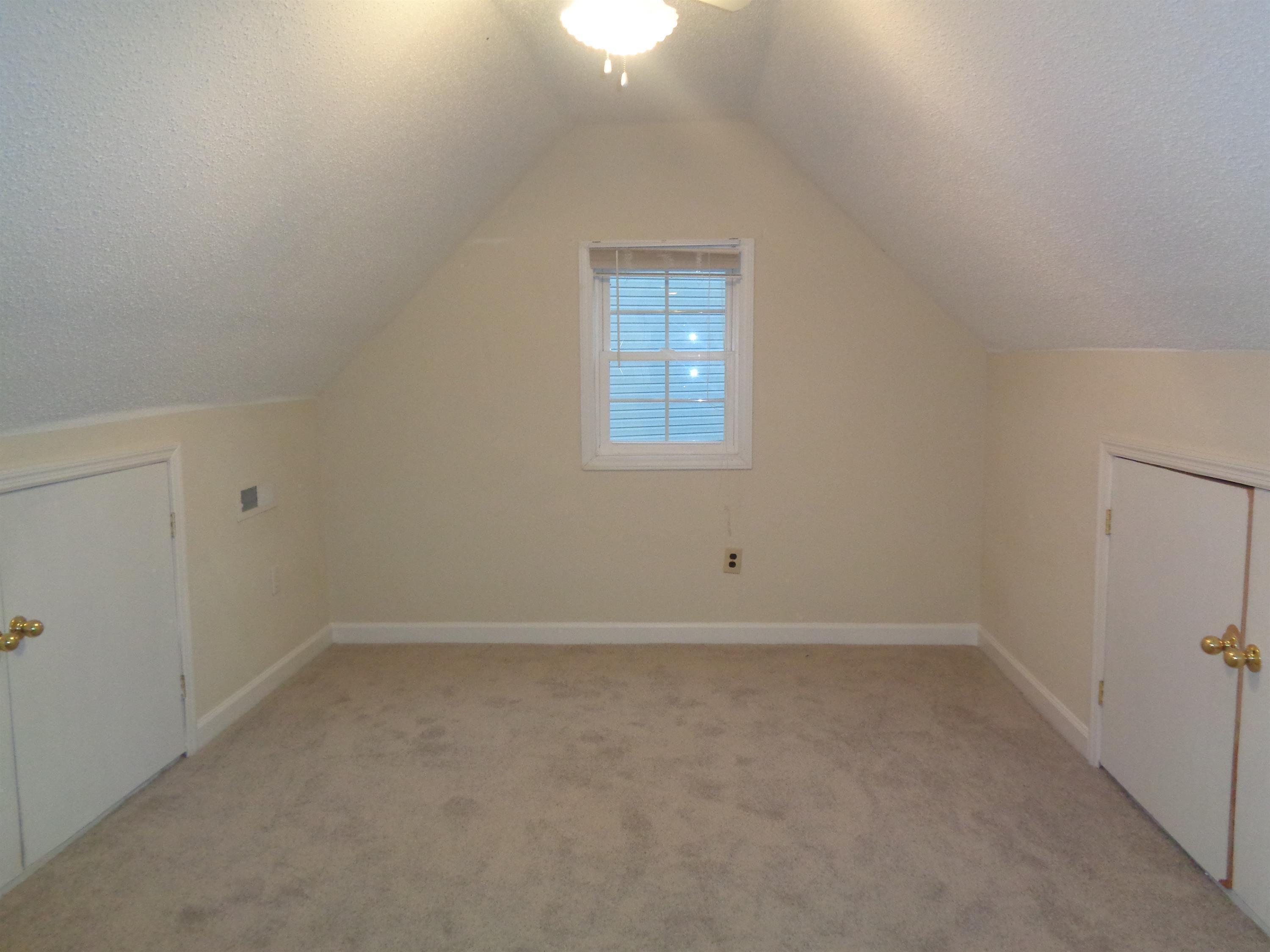 2704 Moorsfield Court Raleigh, NC 27604 - Photo 21 of 25 an empty room with a window