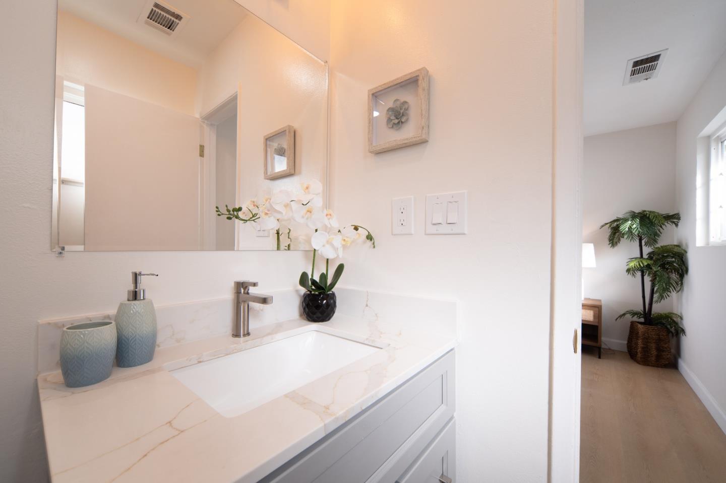 8567 Galindo Drive Dublin, CA 94568 - Photo 13 of 41 a bathroom with a sink and a mirror