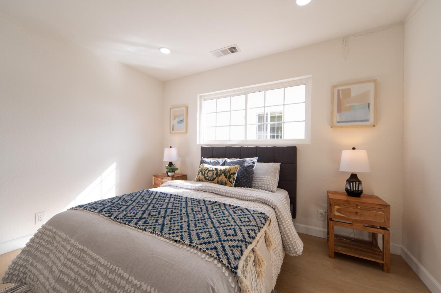 8567 Galindo Drive Dublin, CA 94568 - Photo 18 of 41 a bedroom with a bed and a window