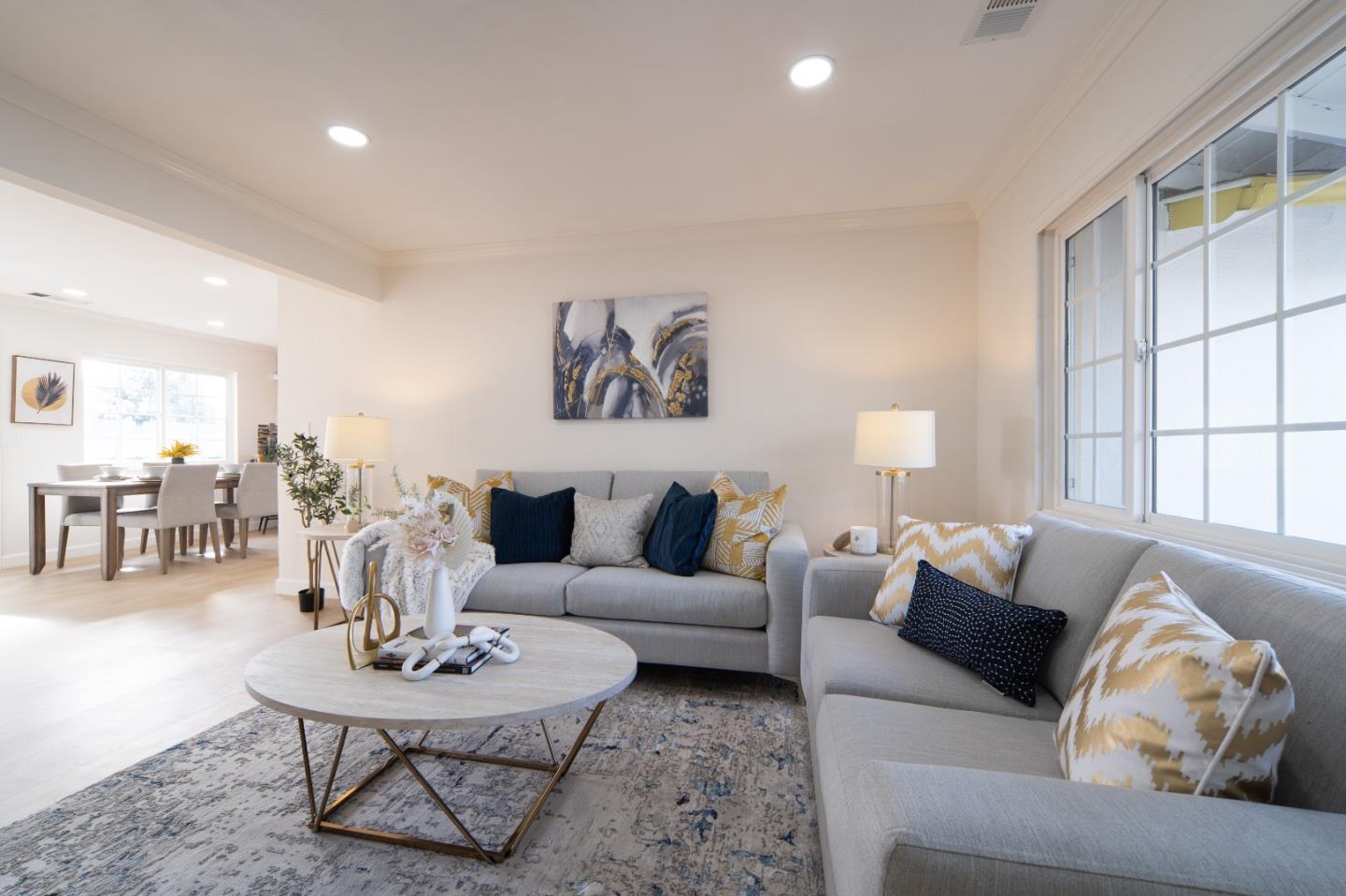 8567 Galindo Drive Dublin, CA 94568 - Photo 2 of 41 a living room with furniture and wooden floor