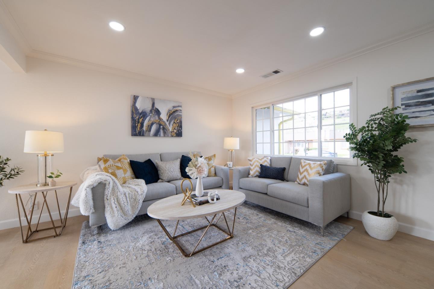 8567 Galindo Drive Dublin, CA 94568 - Photo 3 of 41 a living room with furniture potted plant and a large window