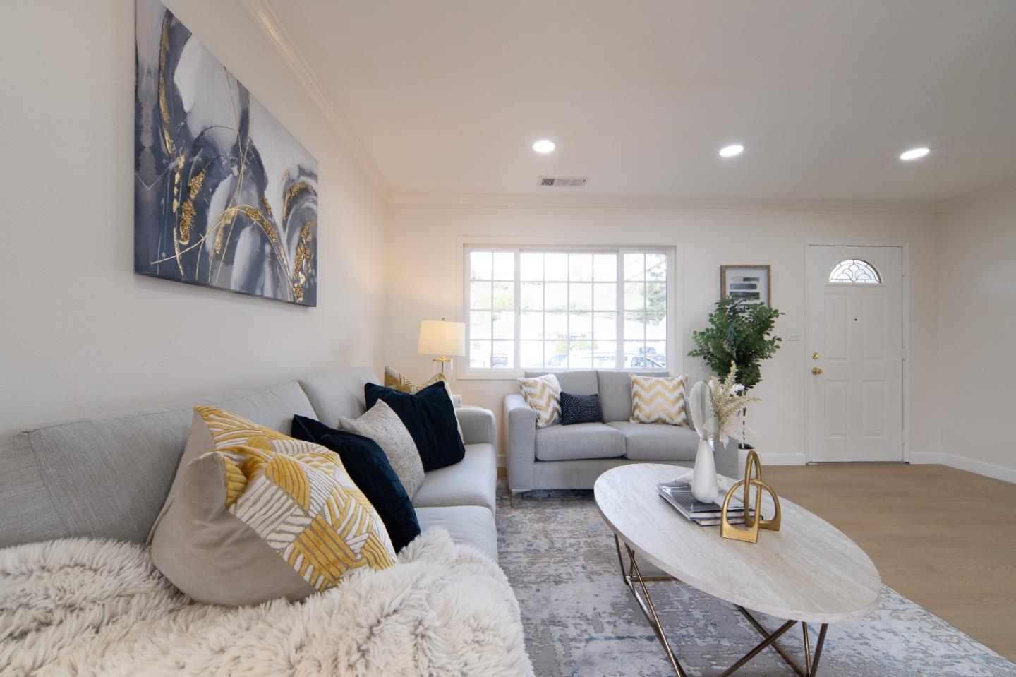 8567 Galindo Drive Dublin, CA 94568 - Photo 4 of 41 a living room with furniture and a potted plant