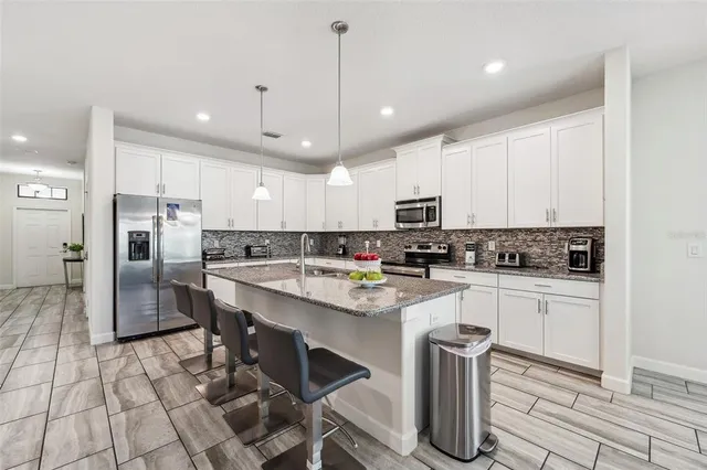 $565,000 | 5512 Solterra Circle, Davenport, FL 33837