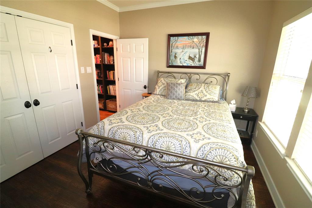 2642 Huddleston Road Sunset, TX 76270 - Photo 20 of 40 a bedroom with a bed and a window