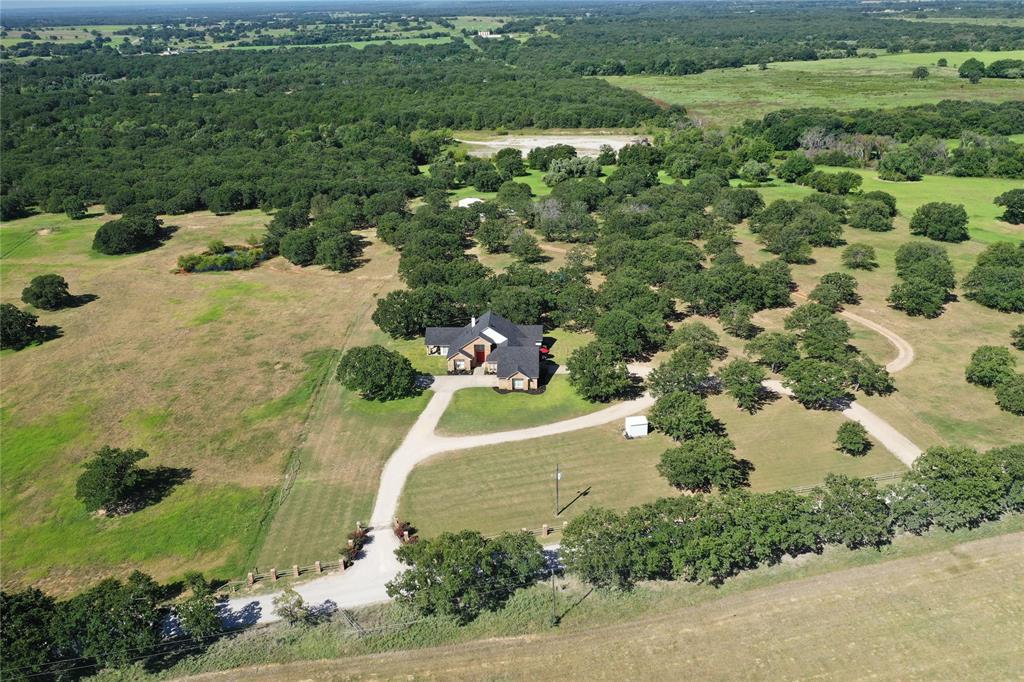 2642 Huddleston Road Sunset, TX 76270 - Photo 2 of 40 an aerial view of a house with a yard