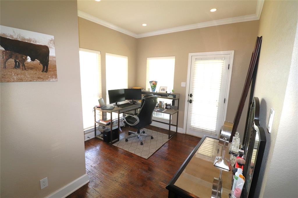 2642 Huddleston Road Sunset, TX 76270 - Photo 26 of 40 a view of a workspace with furniture and a window