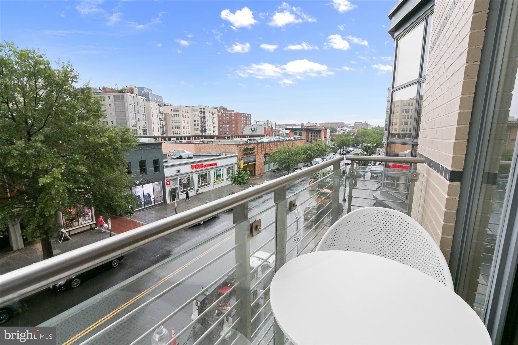 1413 P Street Northwest, Unit 301 Washington, DC 20005 - Photo 13 of 25 Private Balcony showcasing expansive city views!