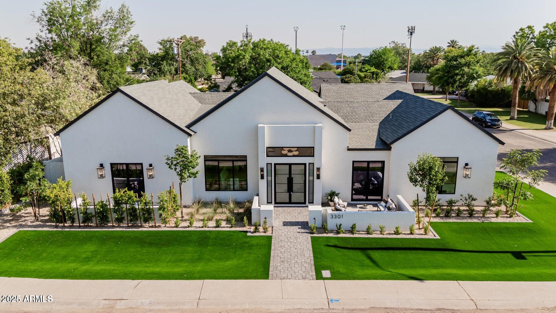 3301 East Elm Street Phoenix, AZ 85018 - Photo 1 of 36 a front view of house with yard and green space