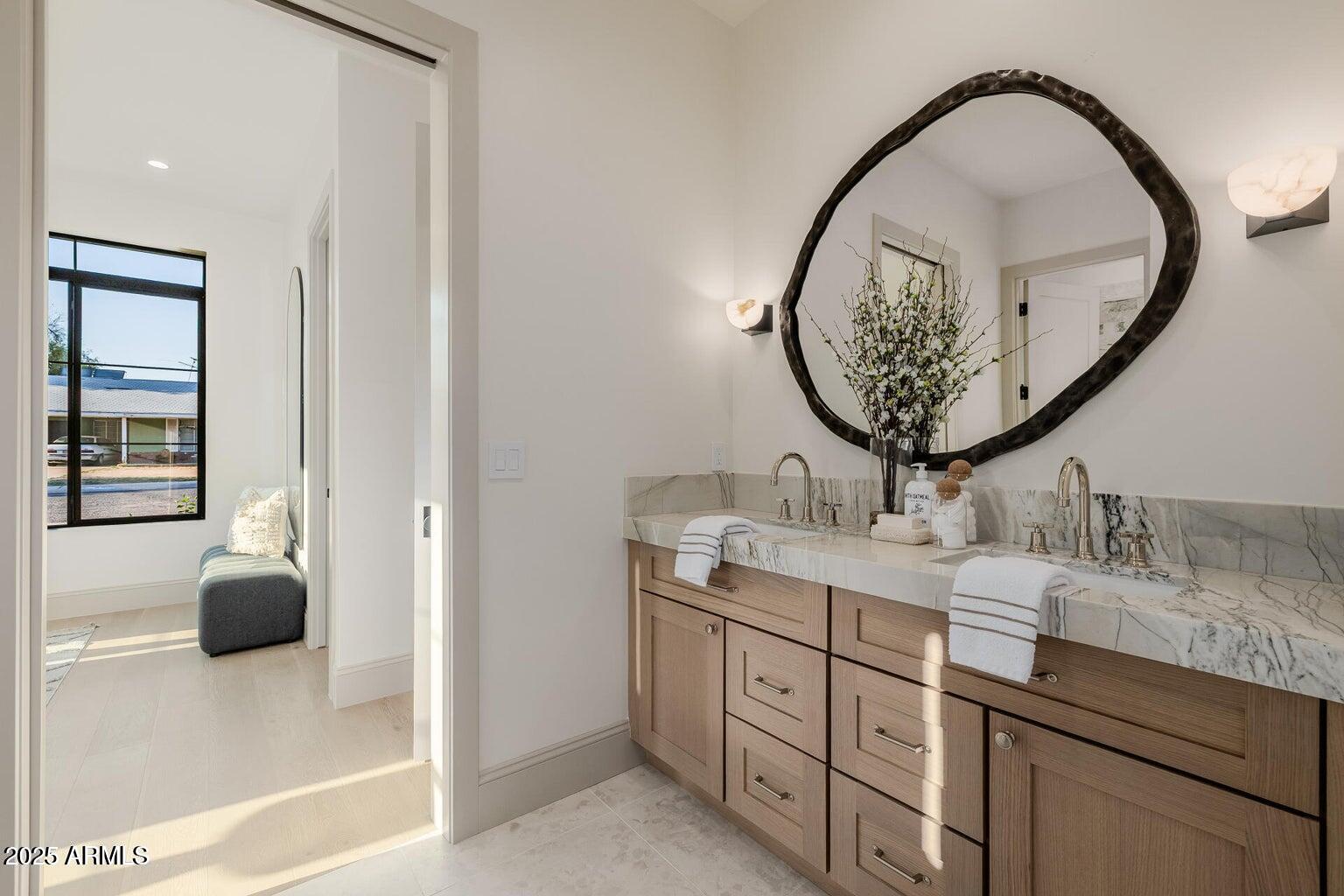 3301 East Elm Street Phoenix, AZ 85018 - Photo 20 of 36 a bathroom with a sink and a mirror