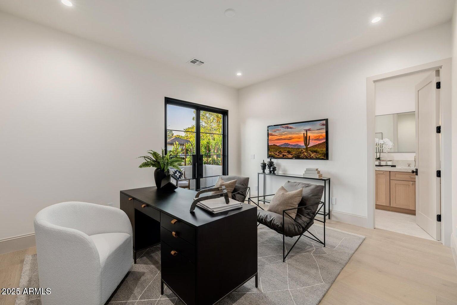 3301 East Elm Street Phoenix, AZ 85018 - Photo 23 of 36 a living room with furniture and a flat screen tv