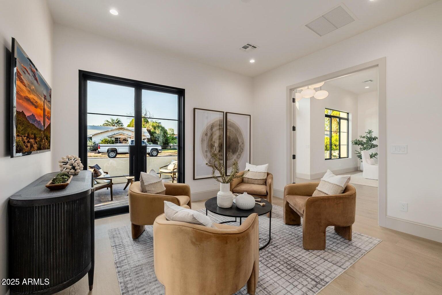 3301 East Elm Street Phoenix, AZ 85018 - Photo 26 of 36 a living room with furniture and a flat screen tv
