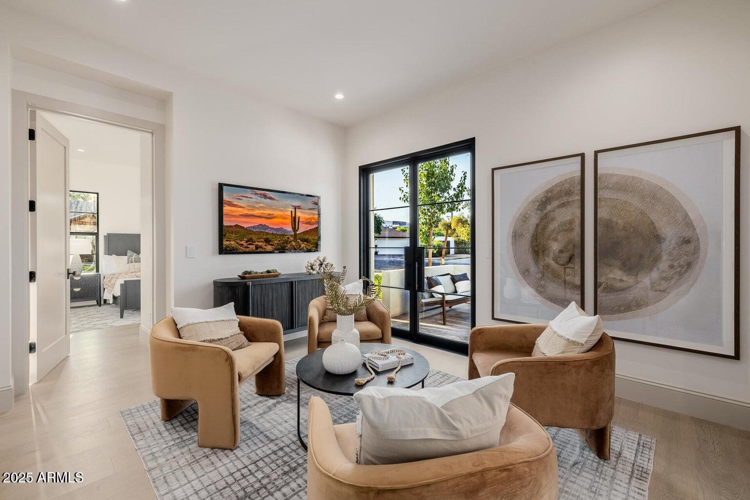 3301 East Elm Street Phoenix, AZ 85018 - Photo 27 of 36 a living room with furniture and a flat screen tv